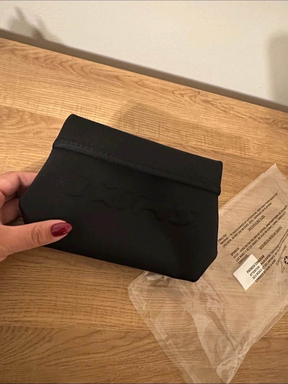 SKIMS Black Neoprene Tablet Sleeve Pouch